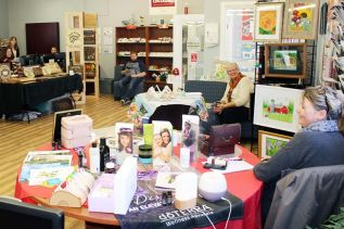 Angie Cowdy of doTerra and Helen Vandesande of Art by Ettje seemed to be enjoying the Small Business Expo last Friday at the St. Lawrence College Employment Service in Sharbot Lake. Photo/Craig Bakay